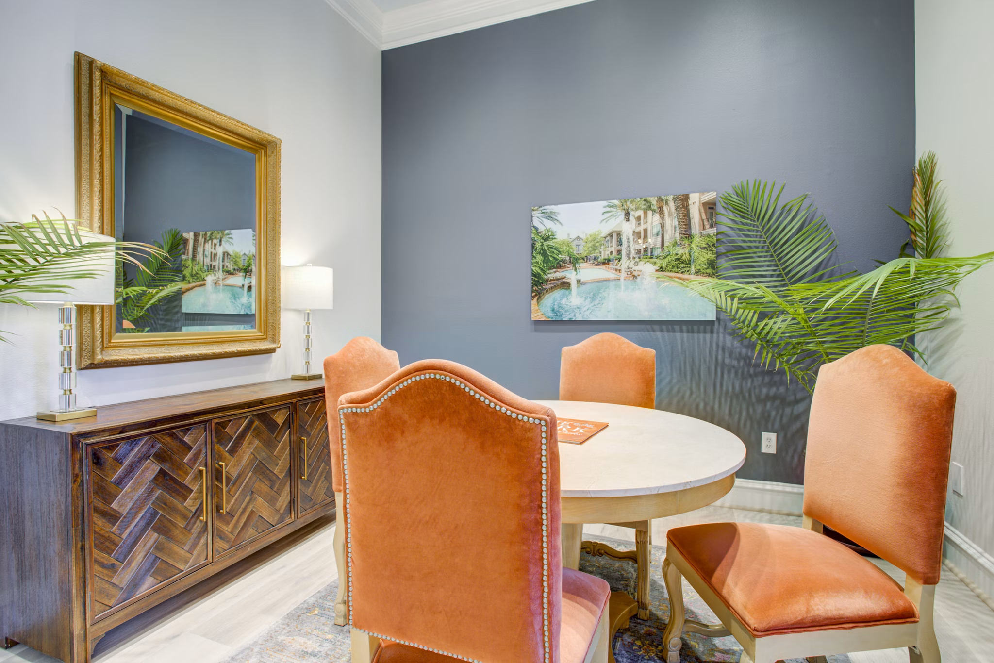 Modern clubhouse with cozy seating and fireplace at Park at River Oaks Apartments