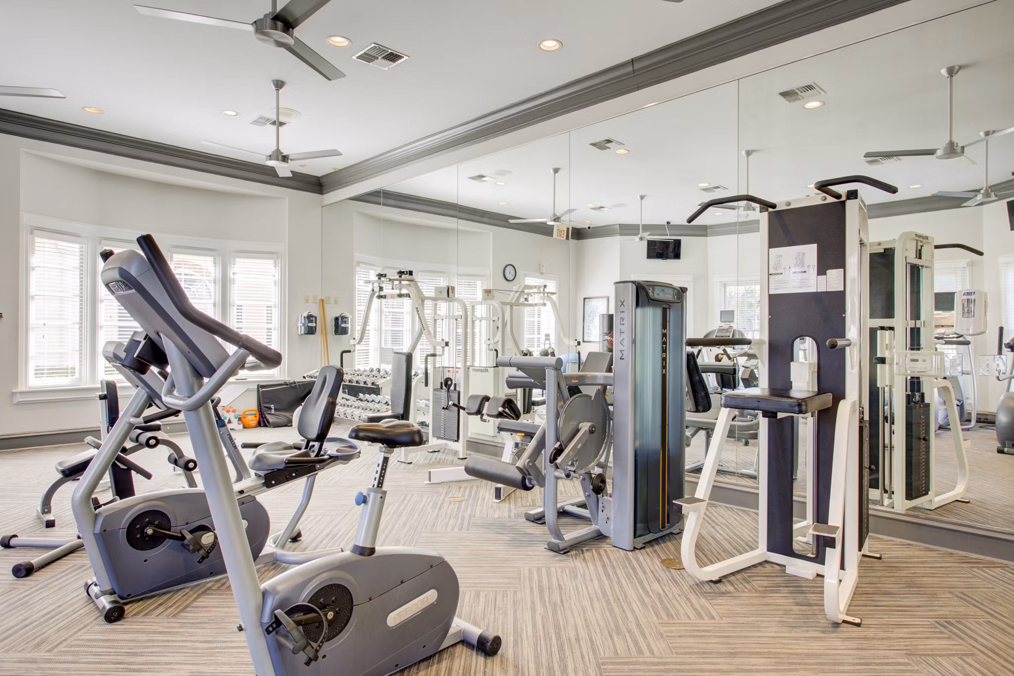 Modern fitness center with state-of-the-art equipment at Park at River Oaks Apartments luxury community
