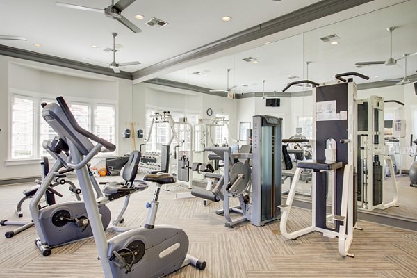 Modern fitness center with state-of-the-art equipment at Park at River Oaks Apartments luxury community
