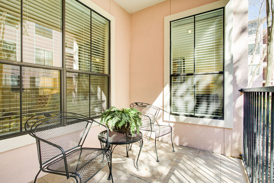 Private balcony with city views at Park at River Oaks Apartments