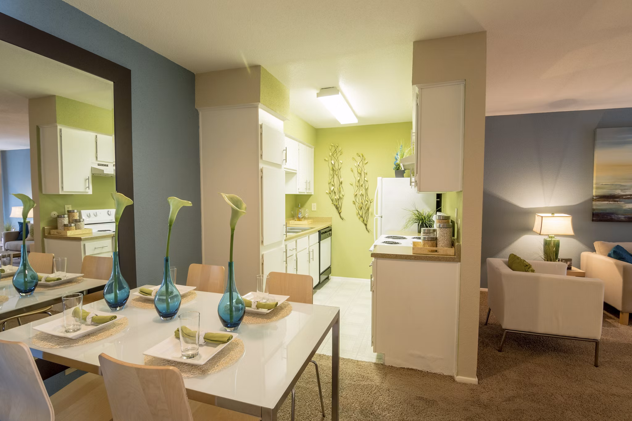 Dining area featuring elegant wooden furniture and modern lighting at The Pines of Woodforest Apartments