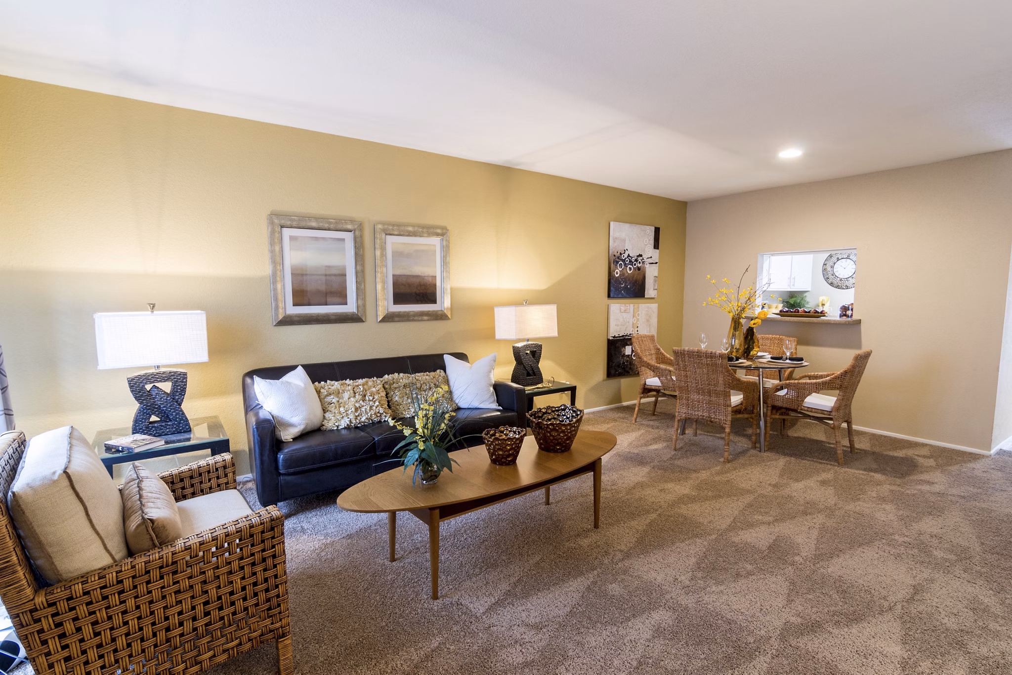Living room with plush seating and modern decor at The Pines of Woodforest Apartments, offering a cozy retreat in a luxurious setting