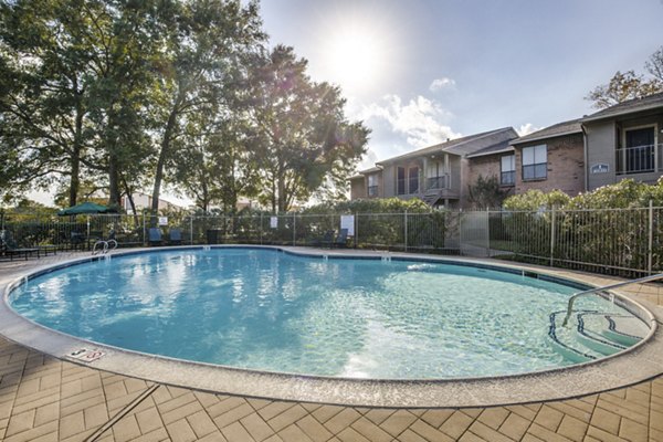 Luxurious pool at The Pines of Woodforest Apartments offering a serene oasis for relaxation and recreation