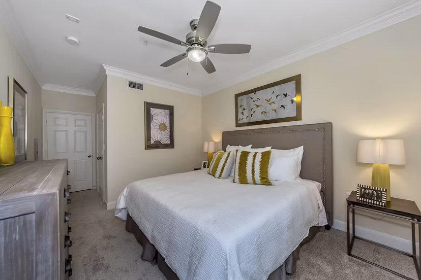 Cozy bedroom with elegant decor in Renaissance at Preston Hollow Apartments