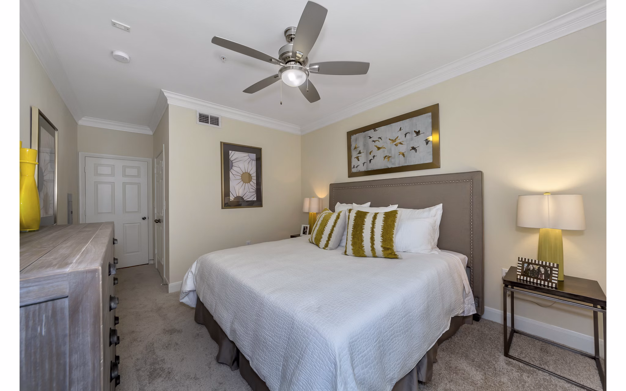 Cozy bedroom with elegant decor in Renaissance at Preston Hollow Apartments