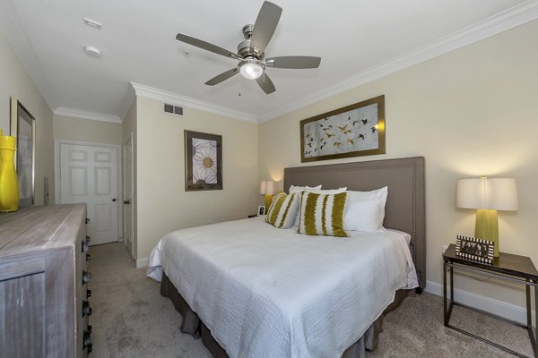 Cozy bedroom with elegant decor in Renaissance at Preston Hollow Apartments