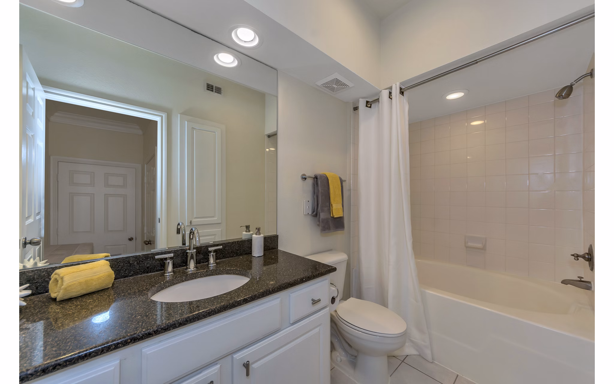 Luxury bathroom with elegant fixtures at Renaissance at Preston Hollow Apartments