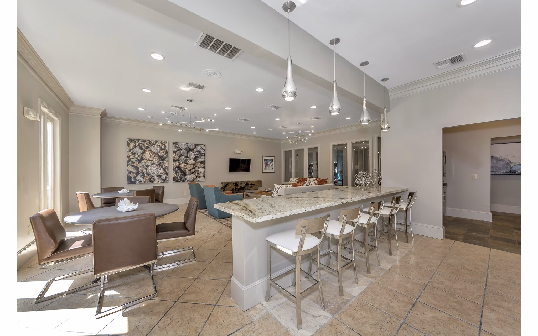 Renaissance at Preston Hollow: Elegant clubhouse featuring modern design and cozy seating areas