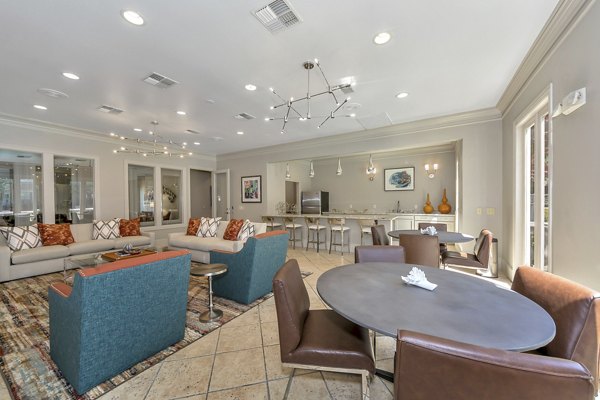 Clubhouse with modern furnishings at Renaissance at Preston Hollow Apartments