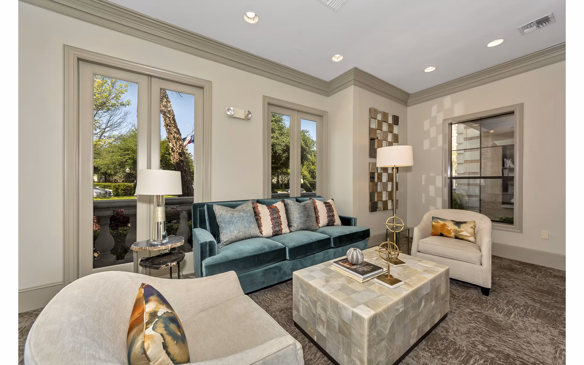Clubhouse with elegant furnishings and ample seating at Renaissance at Preston Hollow Apartments, offering a luxurious social space