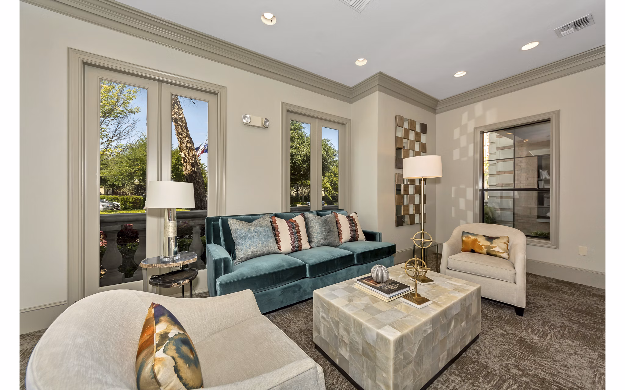 Clubhouse with elegant furnishings and ample seating at Renaissance at Preston Hollow Apartments, offering a luxurious social space