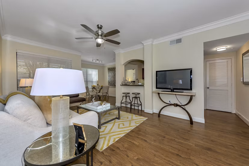 Spacious living room with contemporary decor in Renaissance at Preston Hollow Apartments