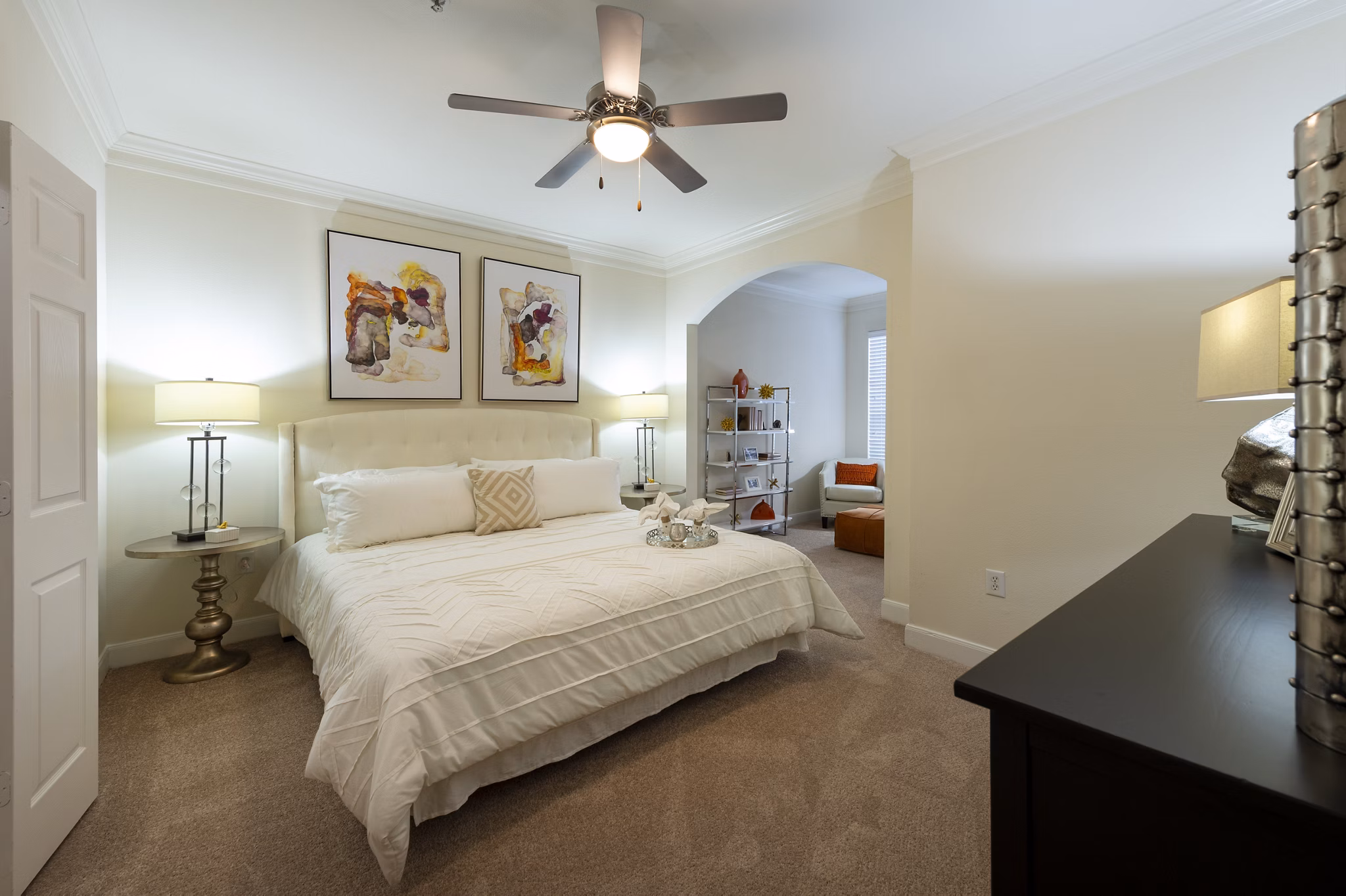 Spacious bedroom with modern decor in The Village at West University Apartments, Houston