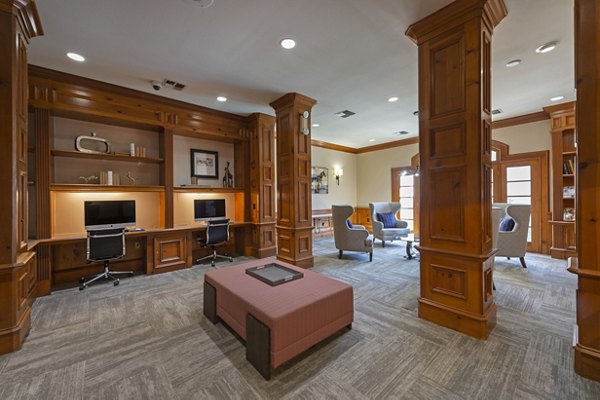 The Village at West University: Elegant clubhouse with modern design and cozy seating areas