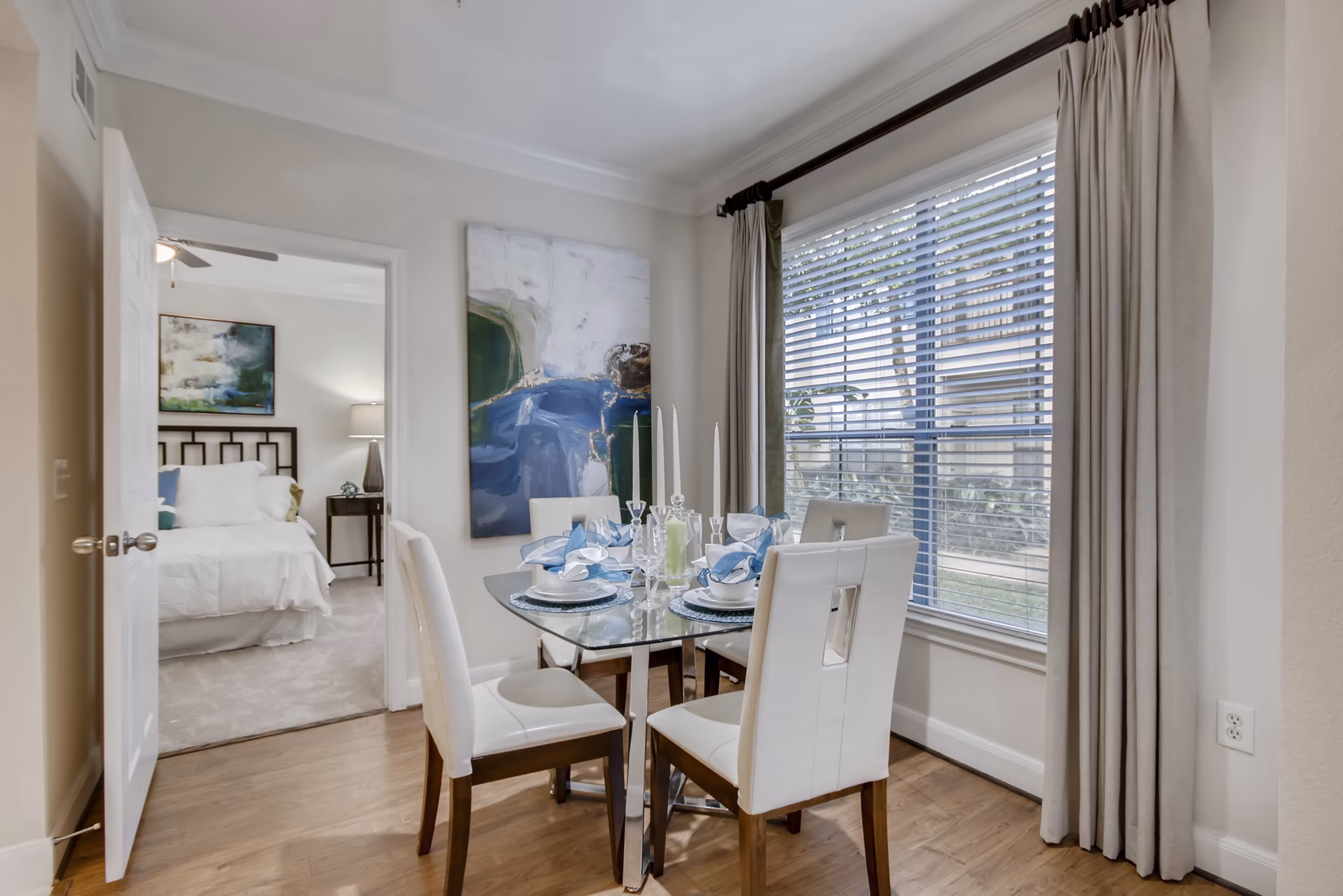 Elegant dining area with modern furnishings at The Village at West University Apartments