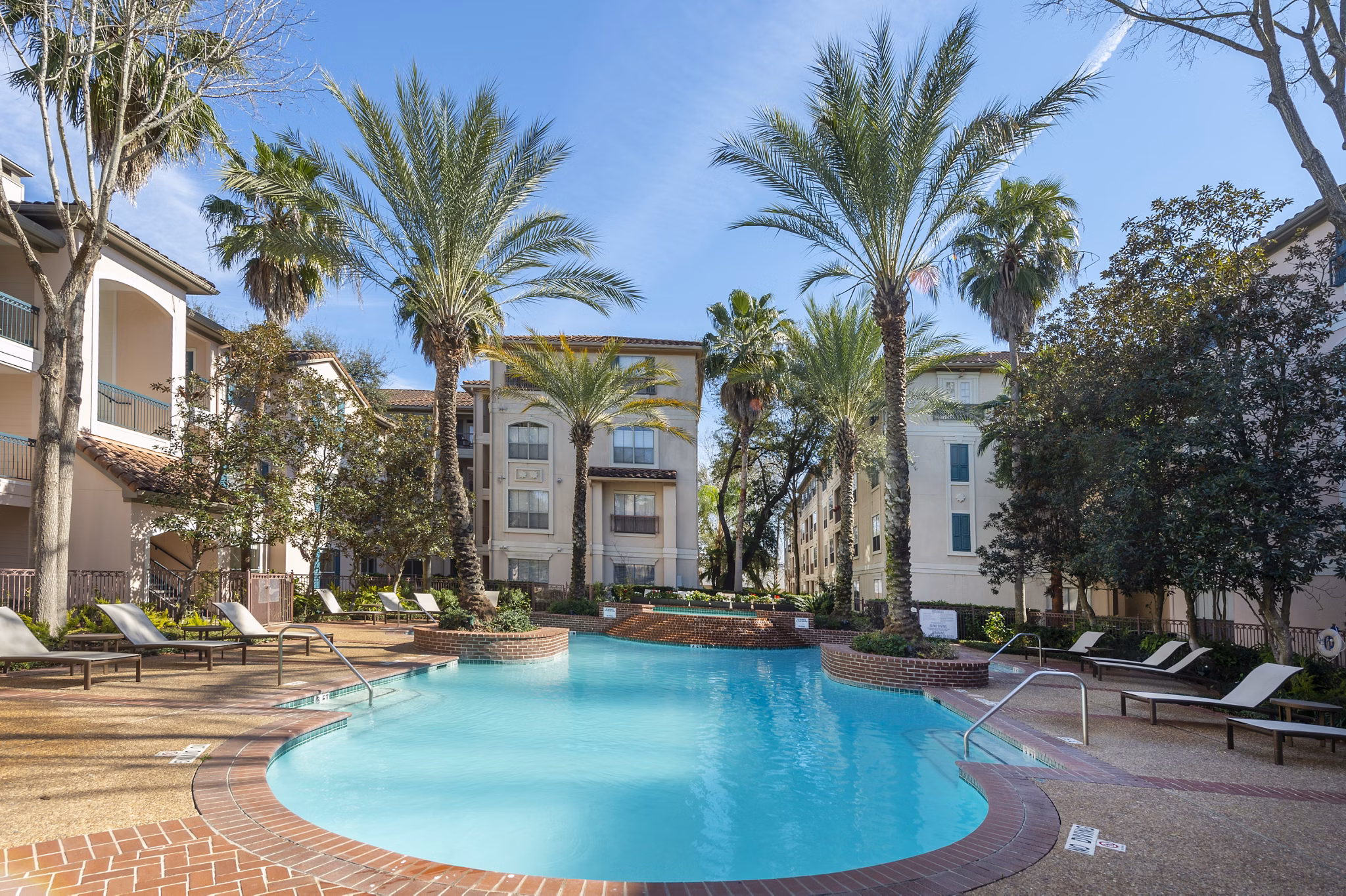 Resort-style pool at The Village at West University Apartments
