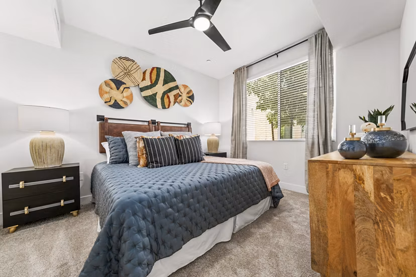 Cozy bedroom with modern furnishings at Overture Arcadia Apartments