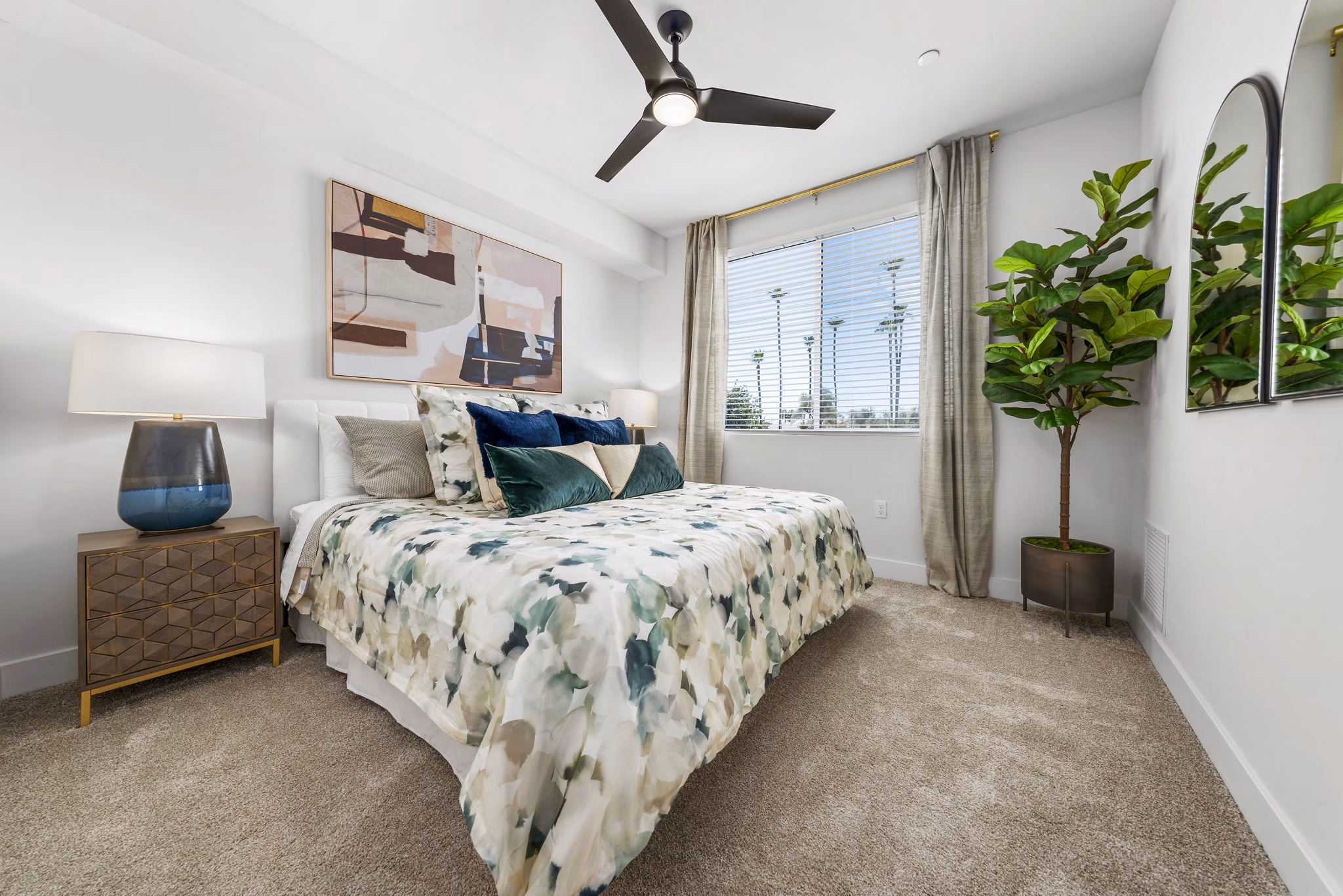 Cozy bedroom with modern decor in Overture Arcadia Apartments