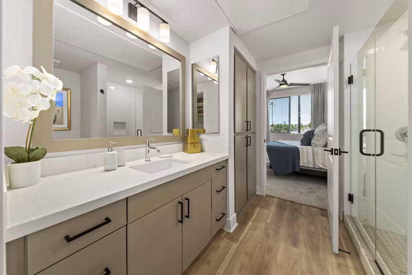 Modern bathroom featuring sleek fixtures and granite countertops at Overture Arcadia Apartments