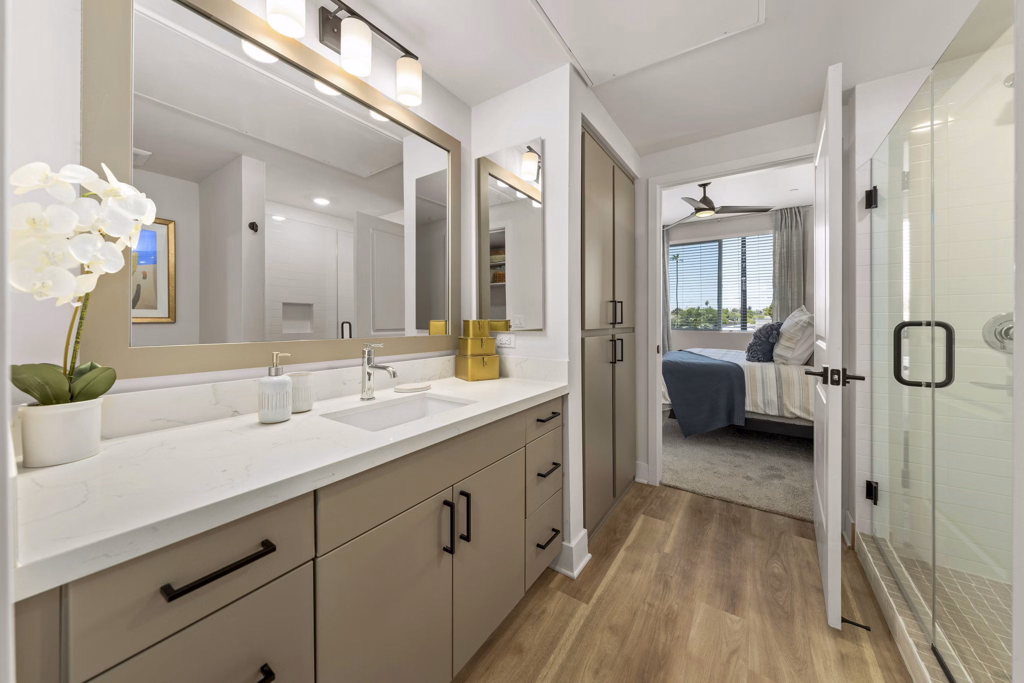 Modern bathroom featuring sleek fixtures and granite countertops at Overture Arcadia Apartments