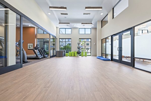 State-of-the-art fitness center with modern equipment at Overture Arcadia Apartments