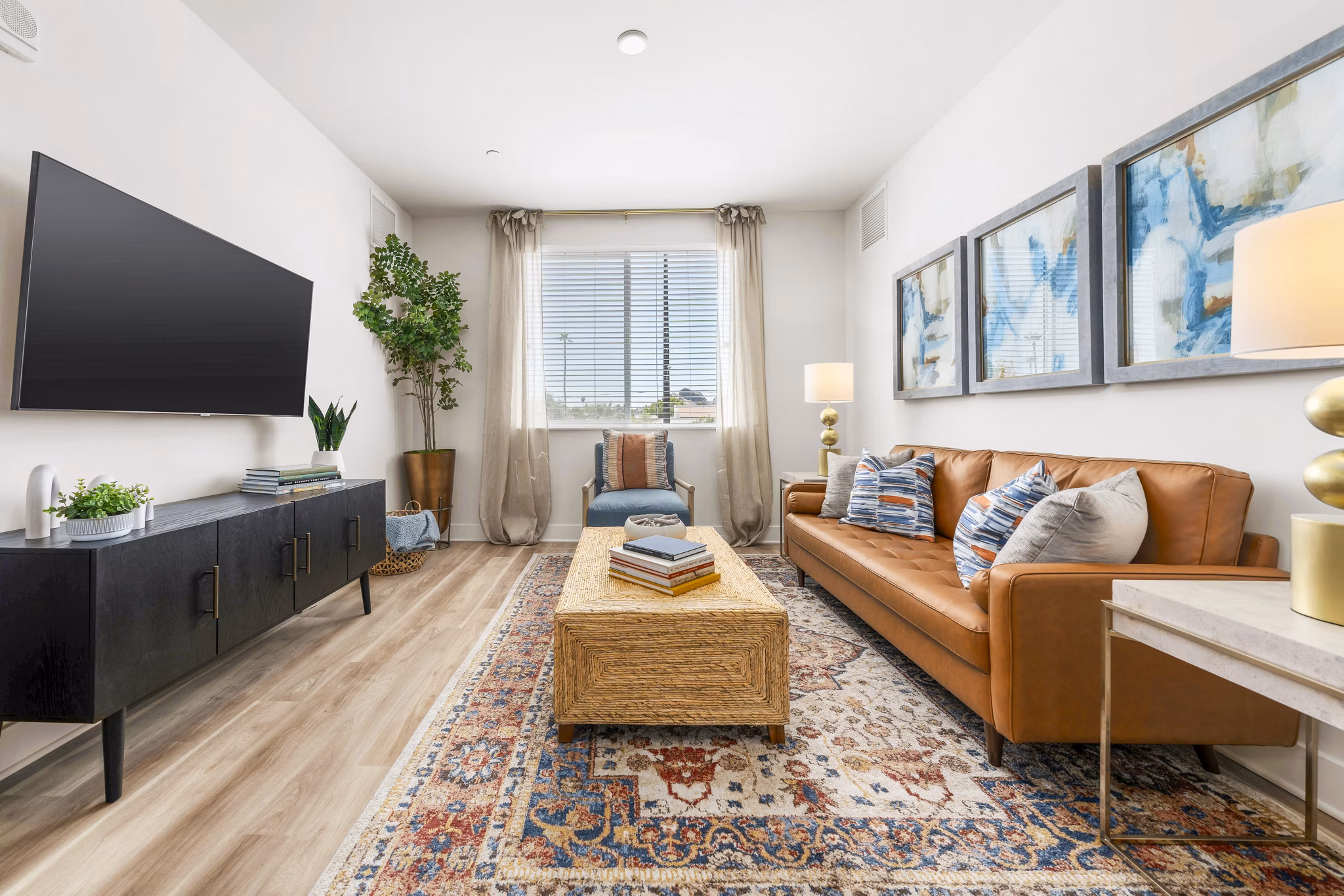 Spacious living room with modern dÃ©cor and natural light at Overture Arcadia Apartments