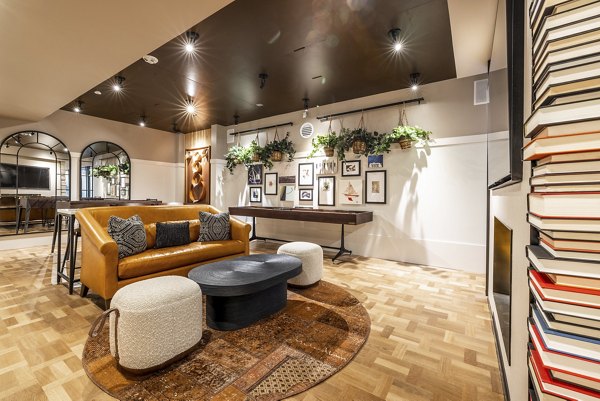 Clubhouse featuring stylish lounge seating and modern decor at Ballard Yards Apartments