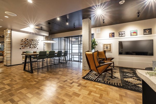 Modern clubhouse featuring stylish decor and communal seating at Ballard Yards Apartments