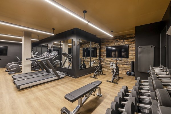 Modern fitness center with state-of-the-art equipment at Ballard Yards Apartments