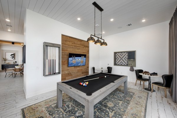 clubhouse game room at Henry House at Clift Farm Apartments