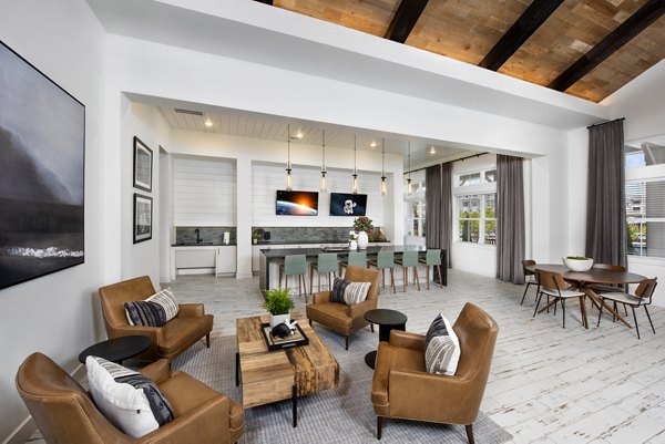 Henry House at Clift Farm: Elegant clubhouse interior with cozy seating and modern decor, perfect for social gatherings and events