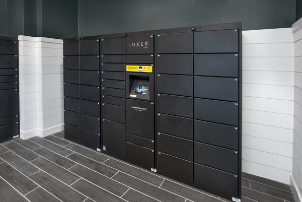 Parcel package pickup lockers at Henry House at Clift Farm Apartments offering convenience and security for residents