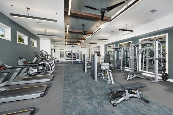 Fitness center with modern equipment at Henry House at Clift Farm Apartments offering luxury amenities for active lifestyles