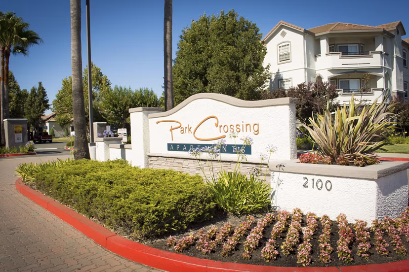 Park Crossing Apartments: Elegant entrance signage for luxury living in the heart of the community