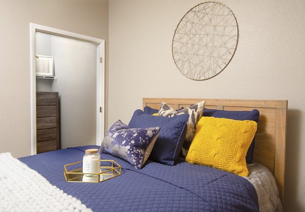 Cozy bedroom with neutral decor at Park Crossing Apartments