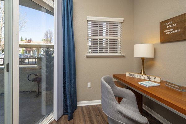 Home office with modern decor and natural light at Park Crossing Apartments