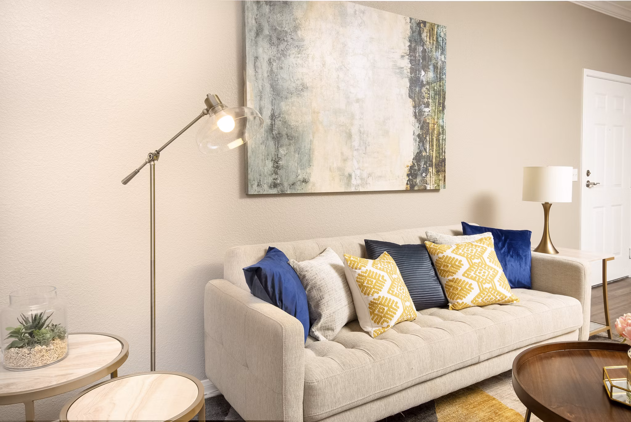 Modern living room with elegant furniture and natural light at Park Crossing Apartments