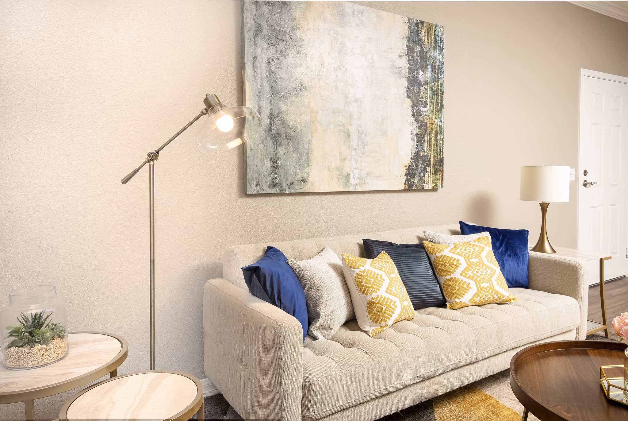 Modern living room with elegant furniture and natural light at Park Crossing Apartments