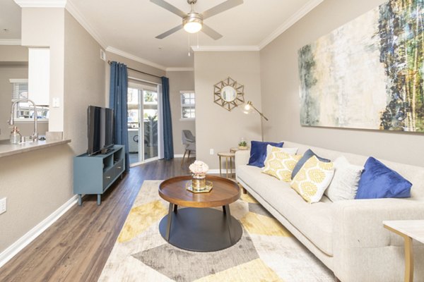 Modern living room with plush sofas and elegant decor at Park Crossing Apartments, offering comfort and style in luxury surroundings