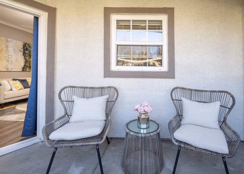 Modern patio with comfortable seating at Park Crossing Apartments, perfect for relaxation and outdoor gatherings