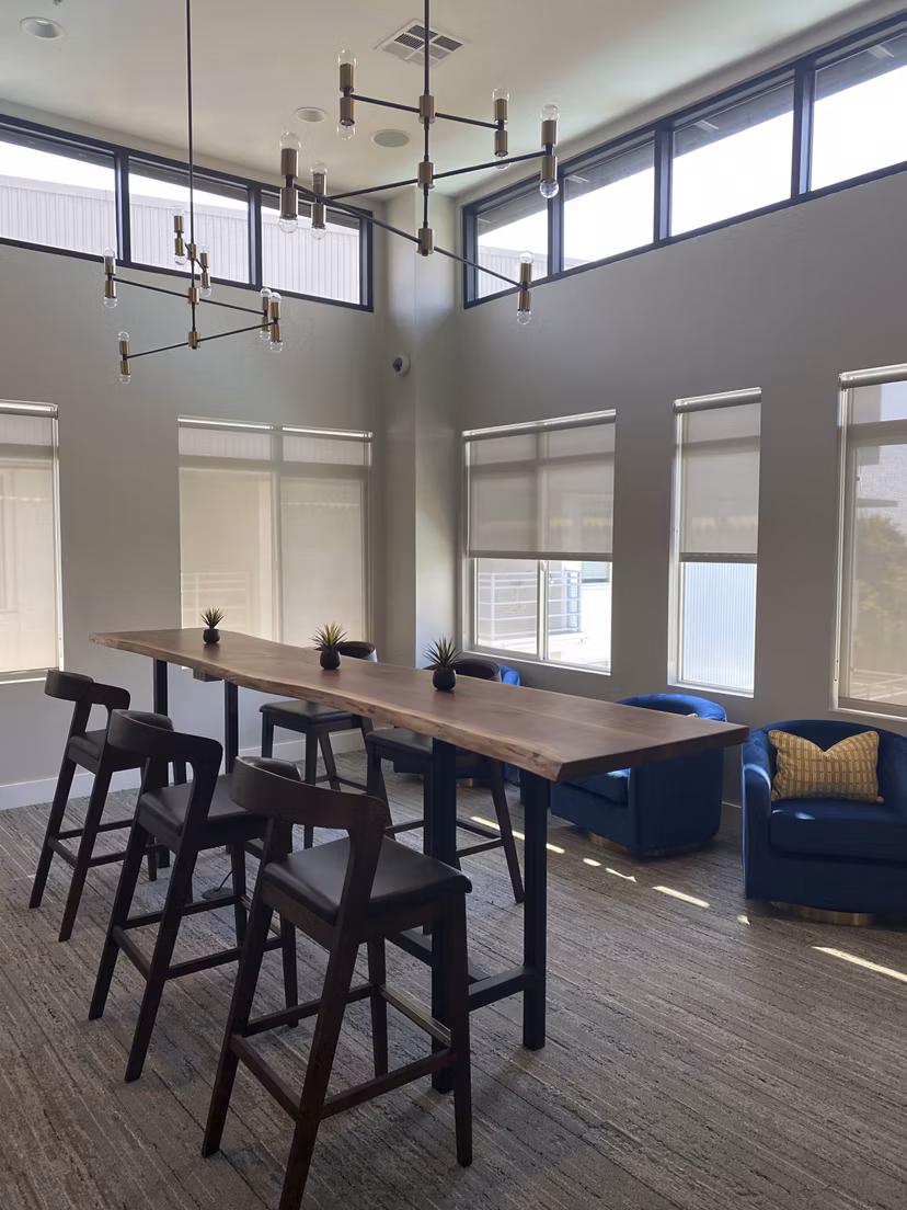 Clubhouse with modern furniture and open seating areas at Westgate Apartments