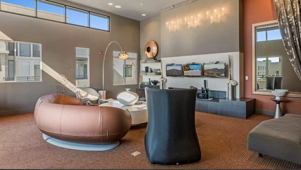 Chic clubhouse featuring modern decor and seating at Westgate Apartments, ideal for resident gatherings and social events