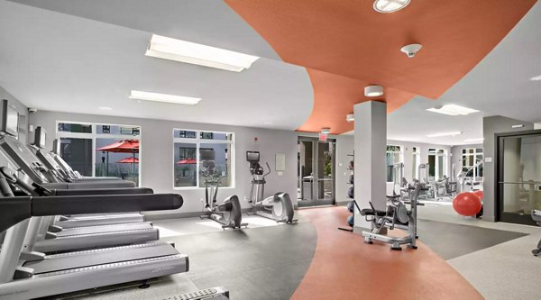 State-of-the-art fitness center featuring modern equipment at Westgate Apartments
