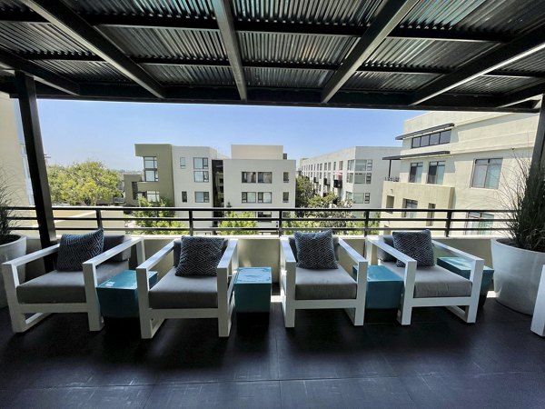 Cozy patio with stylish seating at Westgate Apartments offering a relaxing outdoor space for residents to enjoy