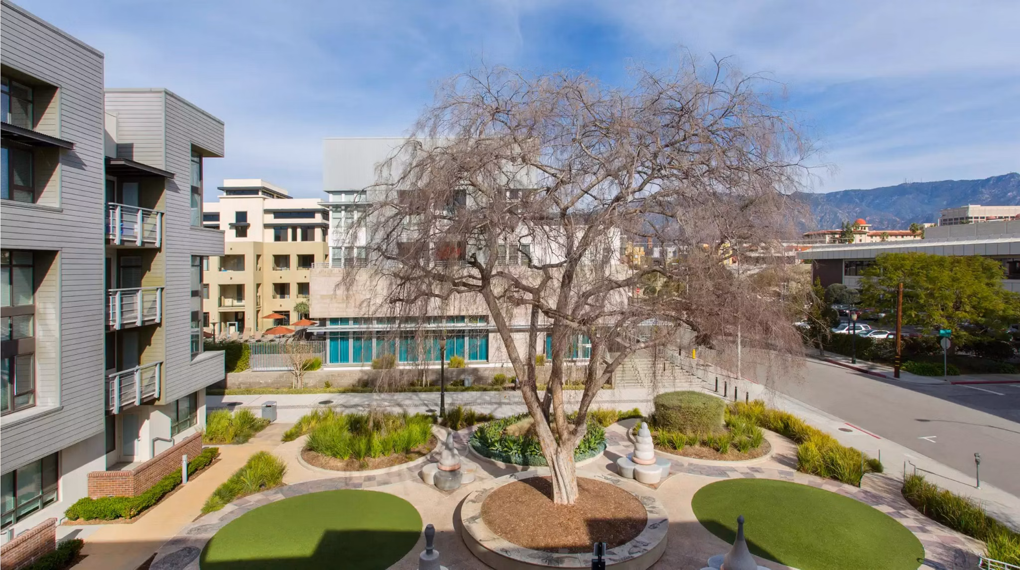 Scenic view from Westgate Apartments: luxury living with expansive cityscape vistas