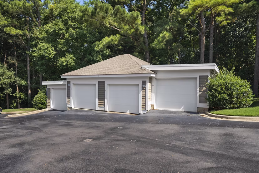 Spacious parking garage at Concord Apartments with ample lighting and secure access for residents
