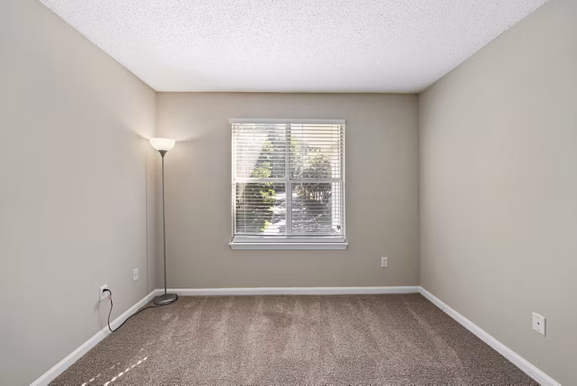 Modern bedroom with elegant decor at Concord Apartments