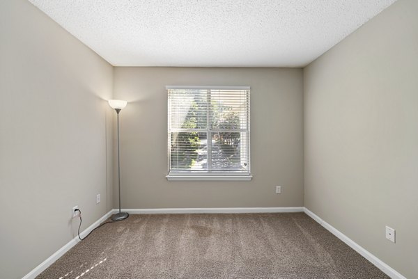 Modern bedroom with elegant decor at Concord Apartments