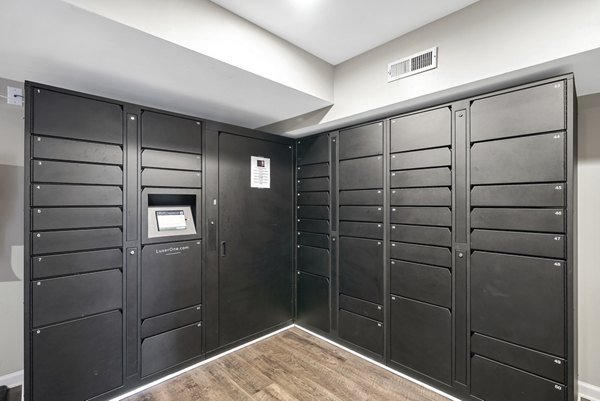 Mail room with organized postal boxes at Concord Apartments in Greystar community