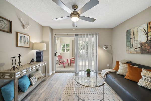 Modern living room with sleek furnishings at Concord Apartments